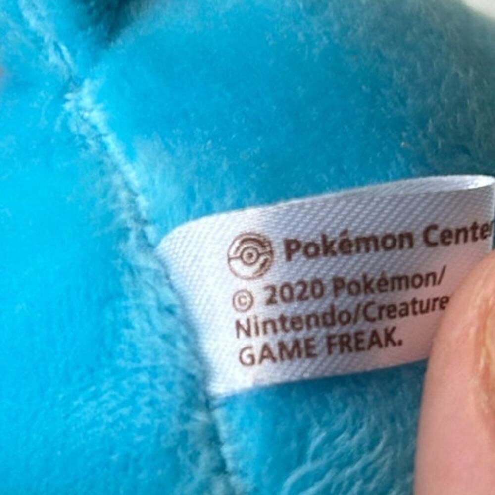 Pokemon Center Mega Tokyo Swablu Plush Keychain Holding Flower NWT - Picture 5 of 13
